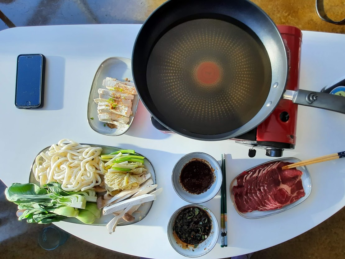 https://www.homecookedfeast.com/wp-content/uploads/2021/01/shabu-shabu-layout.jpg